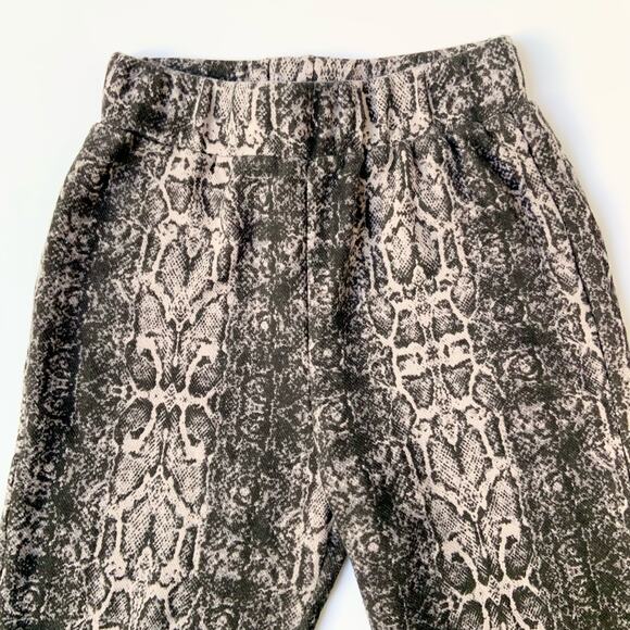 Dolls kill Badee Ivory Black Python Mid Rise Wide Leg Flared Pants sz Medium - Picture 6 of 9